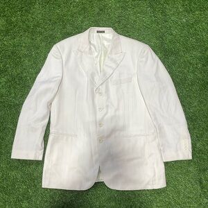 Men’s cream blazer with cream pinstripes.